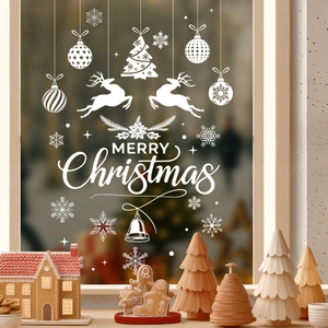 White Christmas window decals with Merry Christmas text, reindeer, and snowflakes