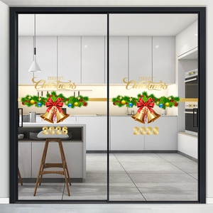 Christmas window stickers with golden bells, pine branches and Merry Christmas text