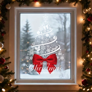 White Christmas tree window decal with red bow and festive snowflake patterns