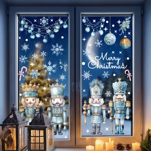 Blue watercolor nutcracker window decals with Merry Christmas text on a winter glass