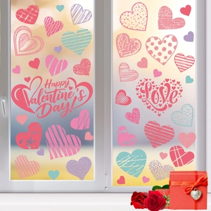Close-up of Valentine's Day window stickers with heart patterns and Happy Valentine's Day text