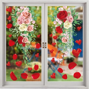 Detail of rose vine static window stickers showing red flowers and heart decals on glass