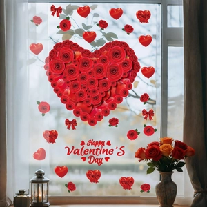 Detail of red rose heart window stickers with Happy Valentine's Day text on glass