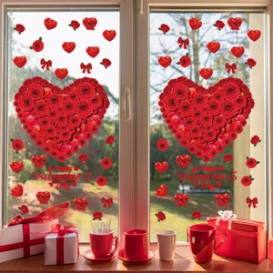 Detail of red heart-shaped window decals with roses for Valentine's Day decor