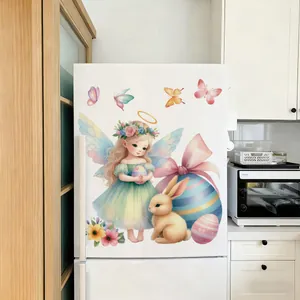 Dettaglio di adesivi elettrostatici pasquali con angelo e coniglio su frigo bianco