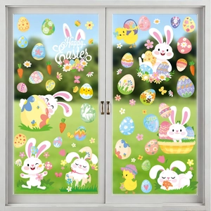 Close-up of Happy Easter window stickers featuring bunnies, chicks and eggs on a glass door