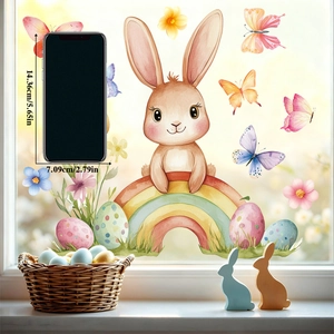 Detailed view of Easter bunny window clings with mobile phone for size scale reference