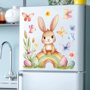 Detailed view of colorful Easter bunny and rainbow static stickers on a white fridge surface