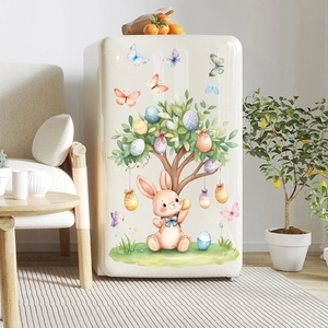 Easter bunny and colorful egg tree static stickers displayed on a beige refrigerator