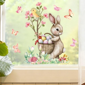 Detail of Easter window stickers featuring watercolor bunnies and floral butterfly patterns