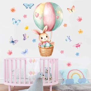 Nursery wall sticker showing a cute bunny in a hot air balloon with watercolor butterflies