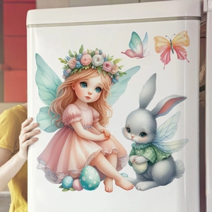 Detailed view of Easter static stickers with cartoon angel, bunny, and colorful eggs on fridge