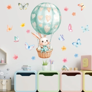 Stickers muraux lapin de Pâques en montgolfière et papillons style aquarelle