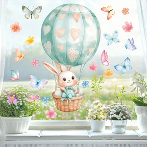 Détail d'autocollants de Pâques avec lapin en montgolfière au style aquarelle