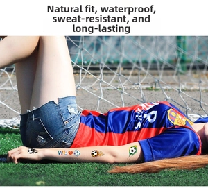 Waterproof football temporary tattoos for kids featuring flame soccer and hearts on arm