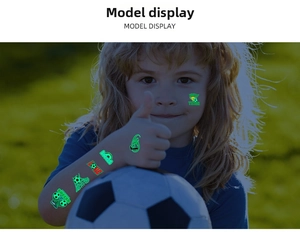 Glow-in-the-dark soccer temporary tattoos with soccer balls and team letters on skin