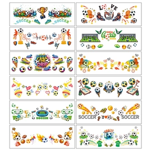 Detailed set of 12 vibrant soccer tattoo stickers with football field and trophy designs