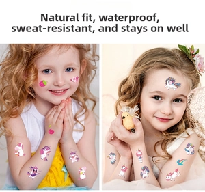 Waterproof cartoon unicorn tattoos on a child's cheek and arm in a cozy home setting
