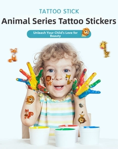 Close-up of waterproof cartoon animal temporary tattoos for kids with lion and fox designs
