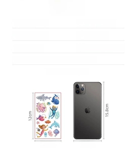 Detailed dimensions of cartoon ocean animal tattoo stickers compared with a smartphone