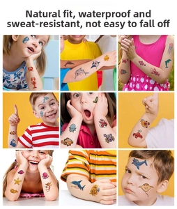 Close-up of waterproof cartoon ocean animal temporary tattoo stickers on children's skin