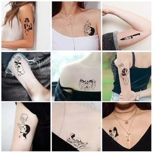 Adesivi per tatuaggi temporanei scuri con illustrazioni artistiche nere per la pelle