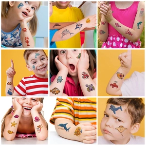 Colorful ocean animal temporary tattoos for kids featuring shark and dolphin patterns