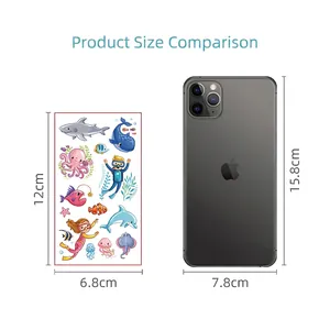 Cartoon ocean animal temporary tattoo stickers shown next to a phone for size comparison