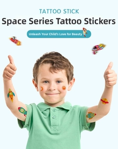 Space series cartoon temporary tattoos showing rocket and planet designs on a child boy