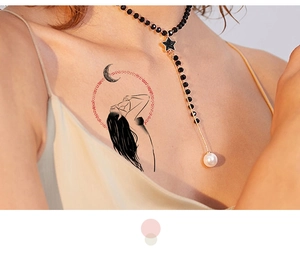 Detail of artistic female silhouette temporary tattoo and elegant black beaded necklace