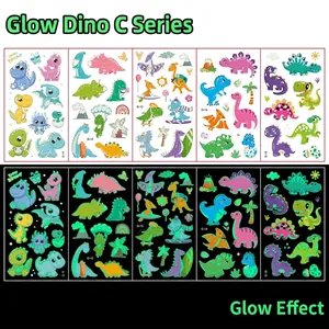 Luminous cartoon dinosaur tattoos showing daytime colors and green glow effect in the dark