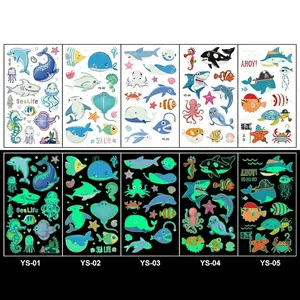 Glow-in-the-dark ocean world temporary tattoos for kids featuring day and night effects