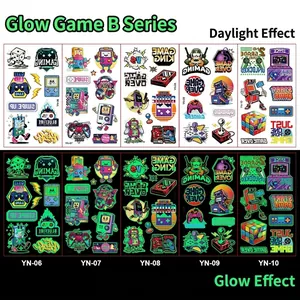 Glow in the dark kids game theme temporary tattoos showing day and night effect