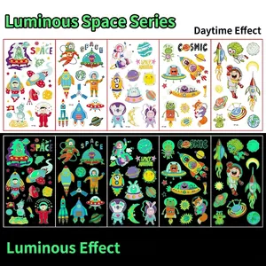 Luminous space tattoos for kids showing day vs night glowing green effect