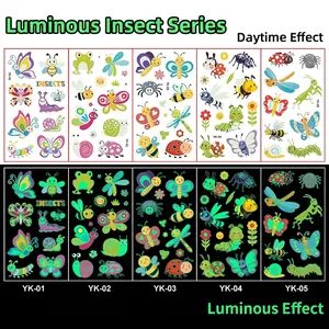 Luminous insect cartoon tattoos showing daytime colors and green glow in the dark effect