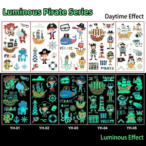Glow in the dark pirate temporary tattoos for kids featuring ships and ocean motifs