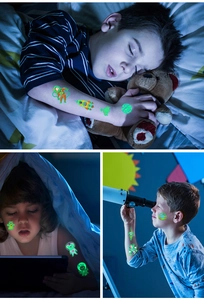 Glow-in-the-dark kids' tattoos featuring astronauts and aliens in night scenes