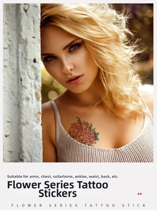 Detail of floral sketch temporary tattoo applied on a woman's shoulder and arm area
