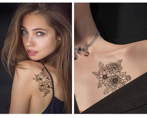 Detail of floral temporary tattoos on shoulder and collarbone with black line art designs