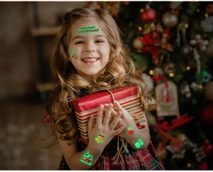 Tatouages temporaires lumineux de Noël pour enfants avec Père Noël et motifs fluorescents