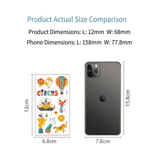 Waterproof circus kids tattoo stickers showing lion and clown patterns next to a phone