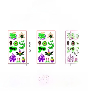 Luminous Halloween temporary tattoo stickers showing 10 sheets with pumpkin and spider designs