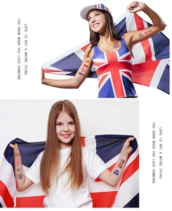 Detail of British flag temporary tattoos featuring London landmarks on model's skin