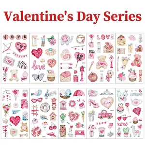 Close-up of 10 Valentine glitter tattoo sheets with hearts, bears and cupcakes for kids