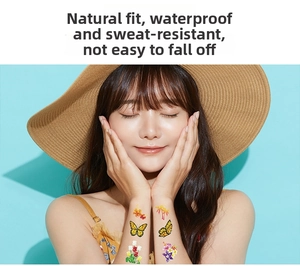 Waterproof colorful butterfly and floral temporary tattoo stickers on woman arm