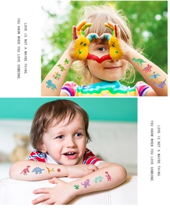 Detail of colorful waterproof dinosaur glitter temporary tattoos for children's party