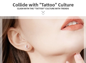 Close-up of minimalist silver dolphin stud earrings worn by a model in a trendy style
