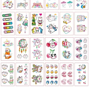 Macro detail of assorted colorful cartoon temporary tattoos with cute bear and unicorn designs