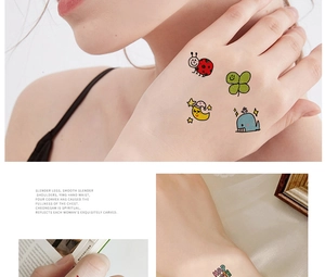 Close-up of cute cartoon ladybug and whale temporary waterproof tattoo stickers