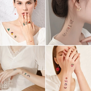 Colorful temporary tattoos with cat and rainbow designs shown on neck and arm skin